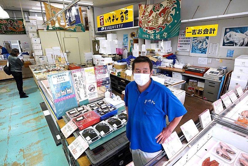 Ichiyoshi fish store manager Hiroharu Haga at the seafood market in Iwaki City, 19 October, 2023